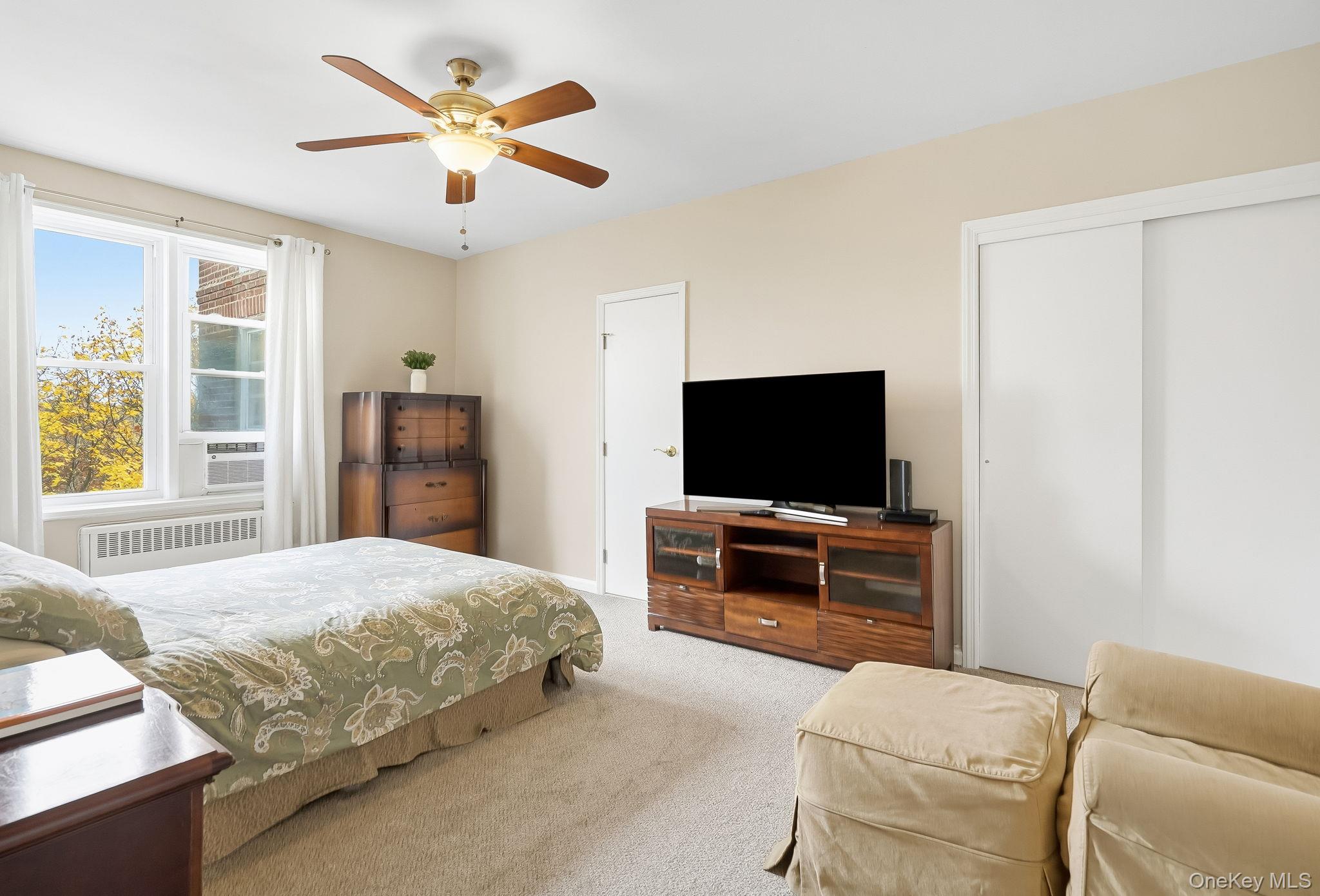 2 Overlook Road, Unit 3C3 White Plains, NY 10605 - Photo 19 of 36 a bedroom with a bed and a flat screen tv