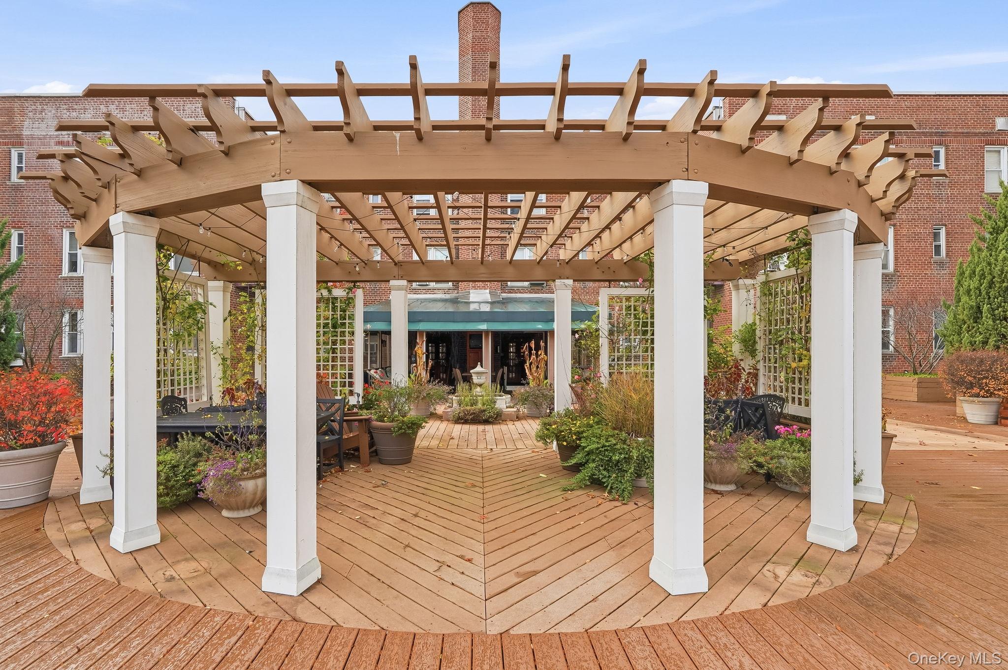 2 Overlook Road, Unit 3C3 White Plains, NY 10605 - Photo 27 of 36 a front view of a house with outdoor seating