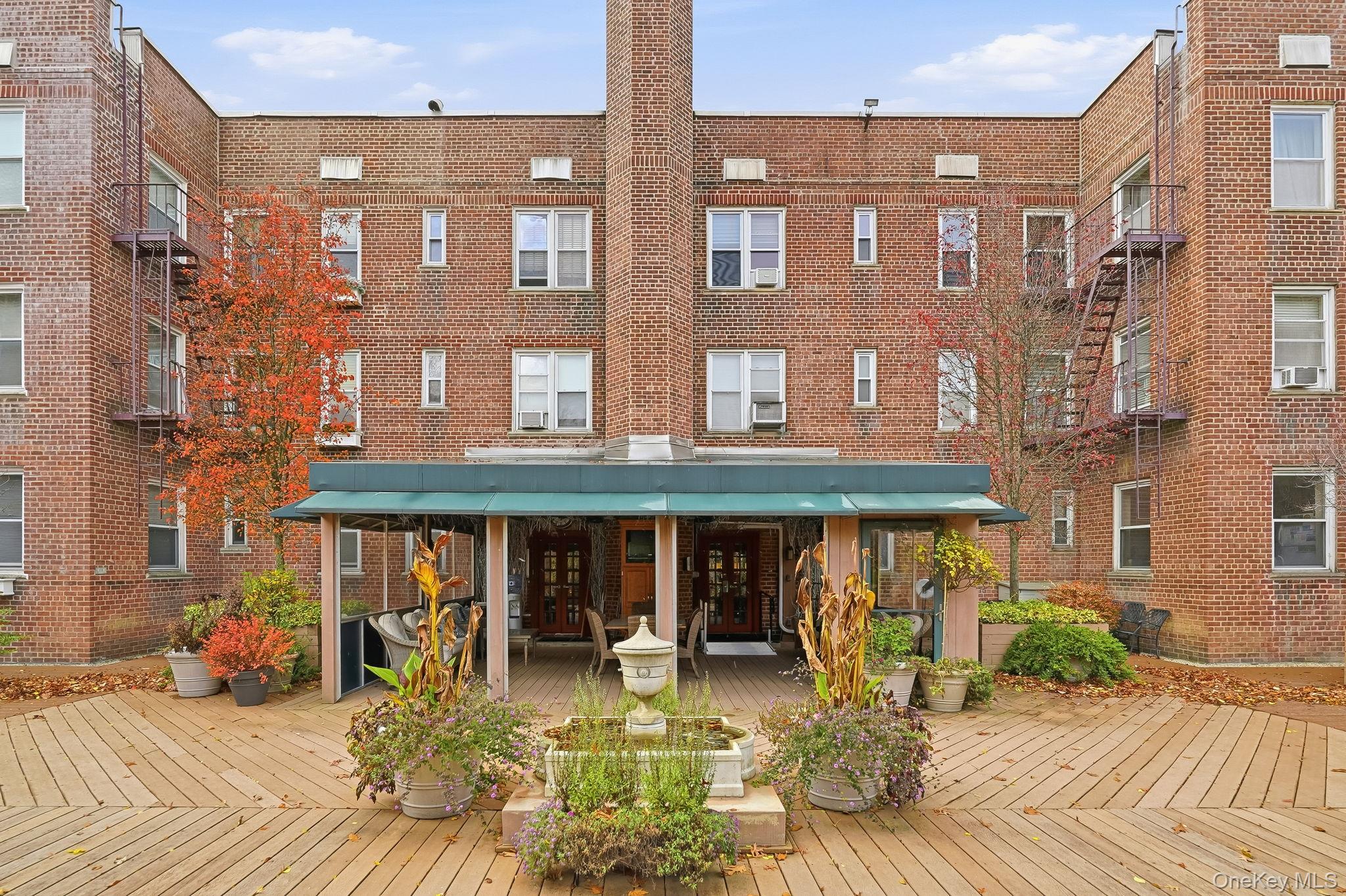 2 Overlook Road, Unit 3C3 White Plains, NY 10605 - Photo 29 of 36 a front view of a building with outdoor seating