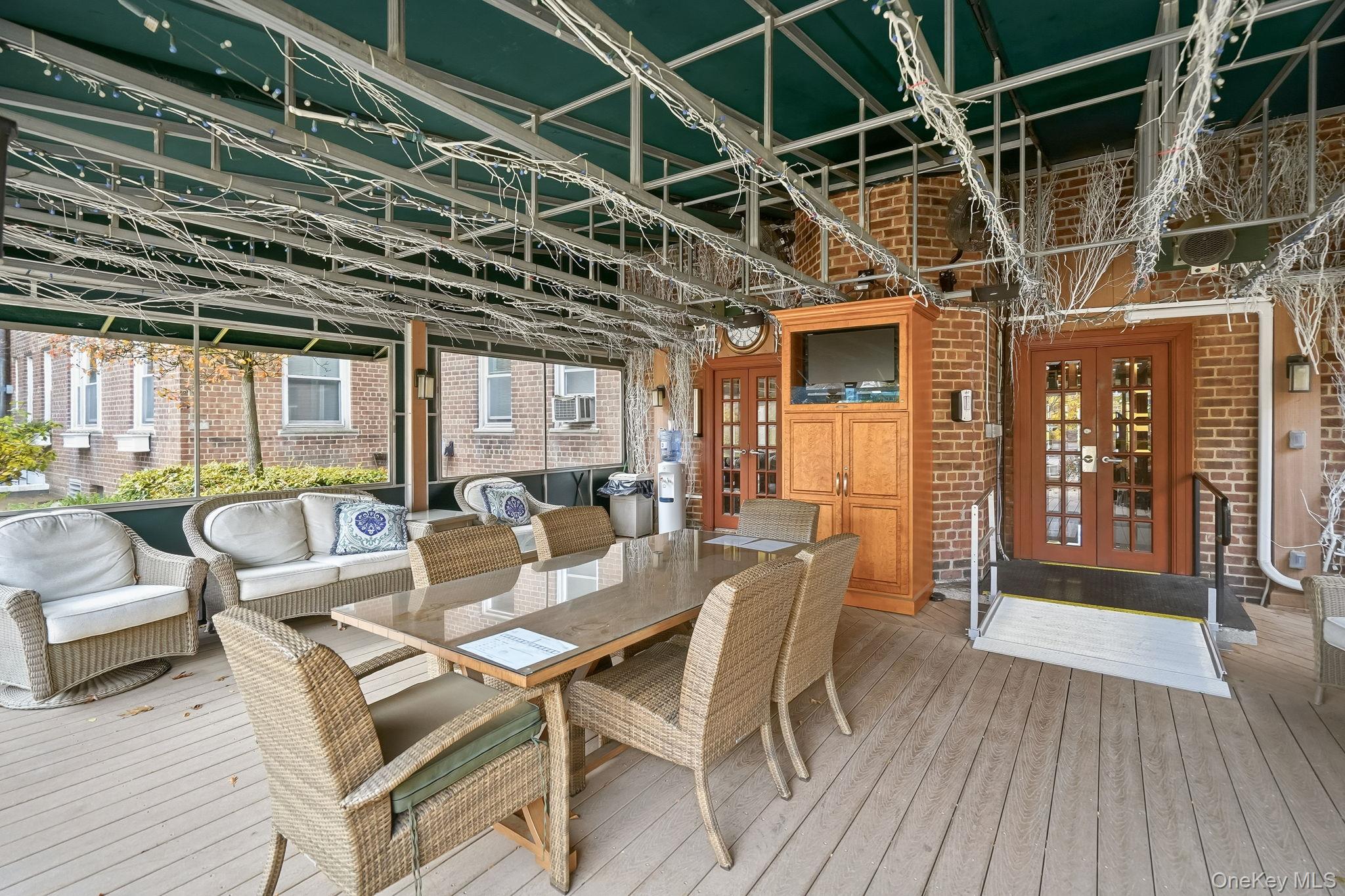 2 Overlook Road, Unit 3C3 White Plains, NY 10605 - Photo 31 of 36 a view of a dining room with furniture and wooden floor