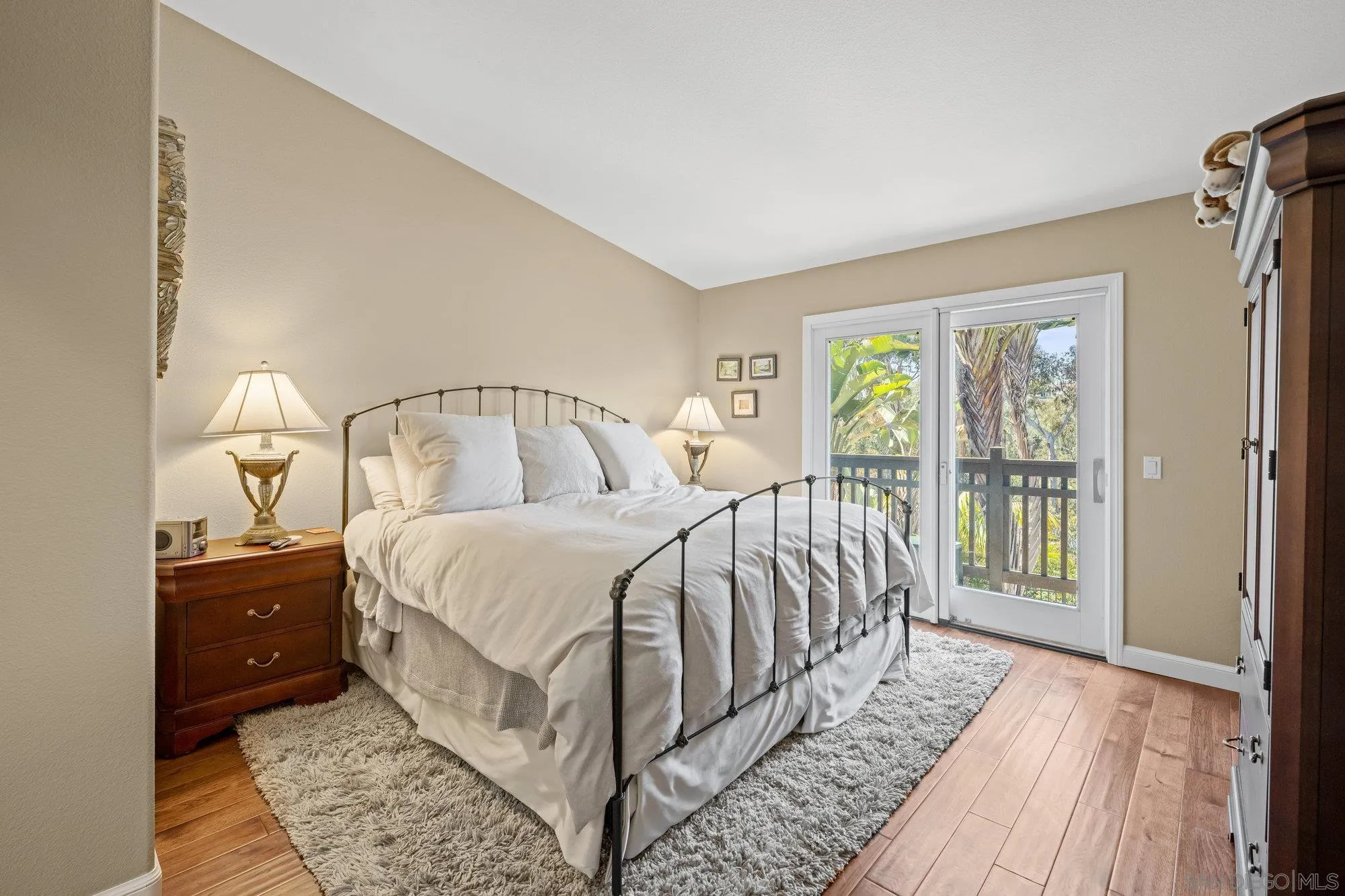6845 Adolphia Drive Carlsbad, CA 92011 - Photo 11 of 33 a bedroom with a bed and a window