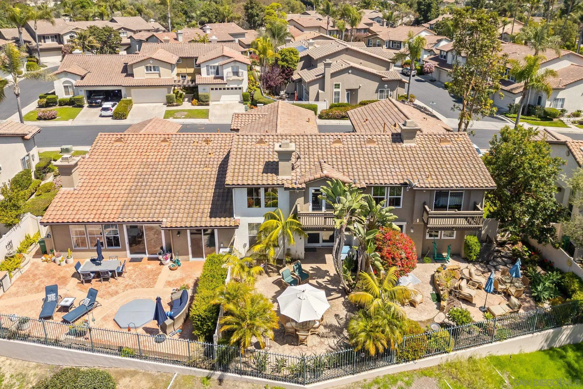 6845 Adolphia Drive Carlsbad, CA 92011 - Photo 28 of 33 an aerial view of residential houses with yard and parking space