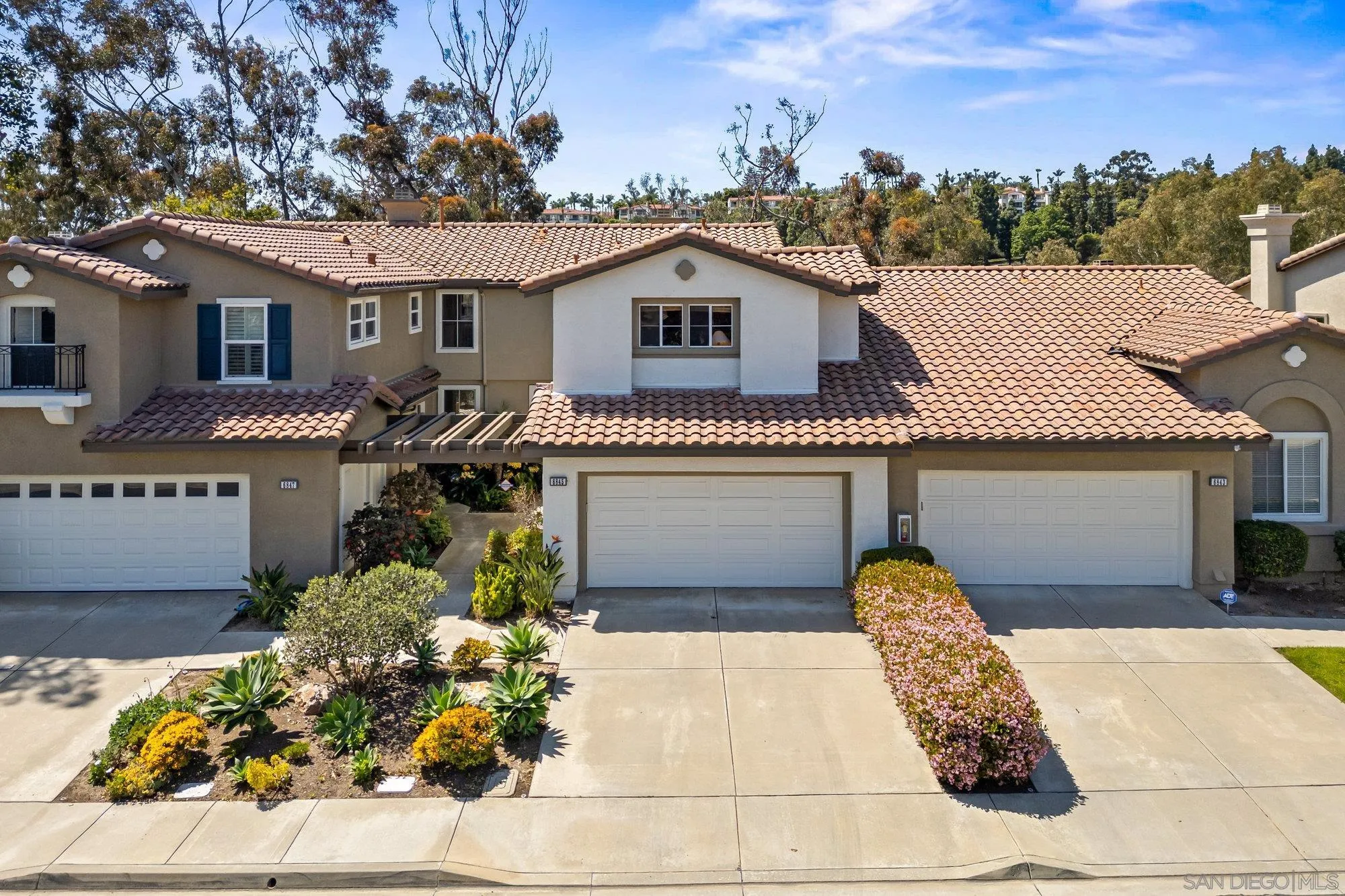 6845 Adolphia Drive Carlsbad, CA 92011 - Photo 33 of 33 a front view of a house with a garden