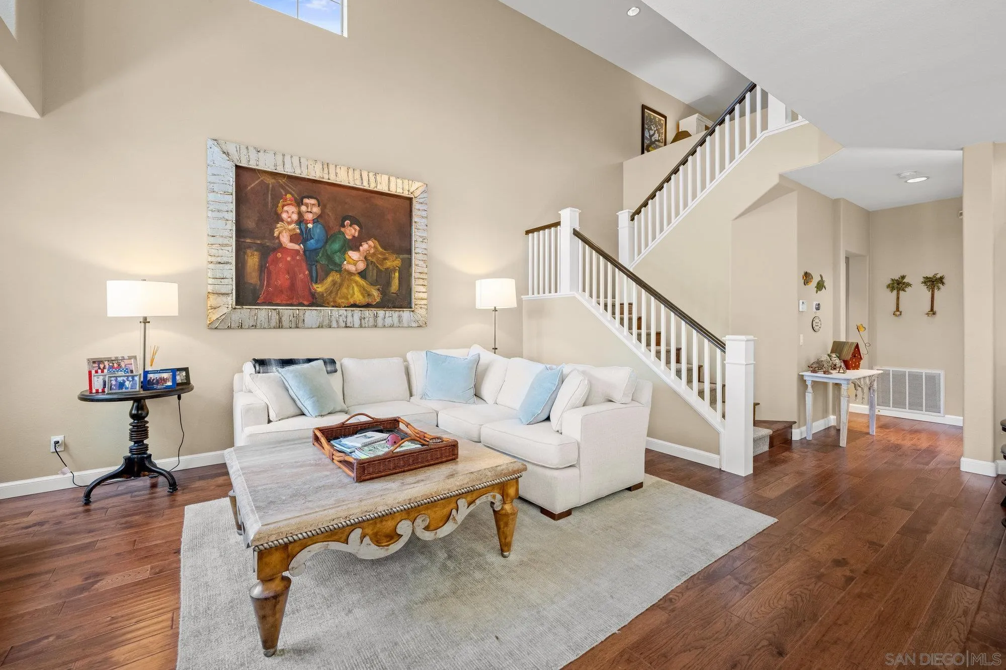 6845 Adolphia Drive Carlsbad, CA 92011 - Photo 8 of 33 a living room with furniture and a wooden floor