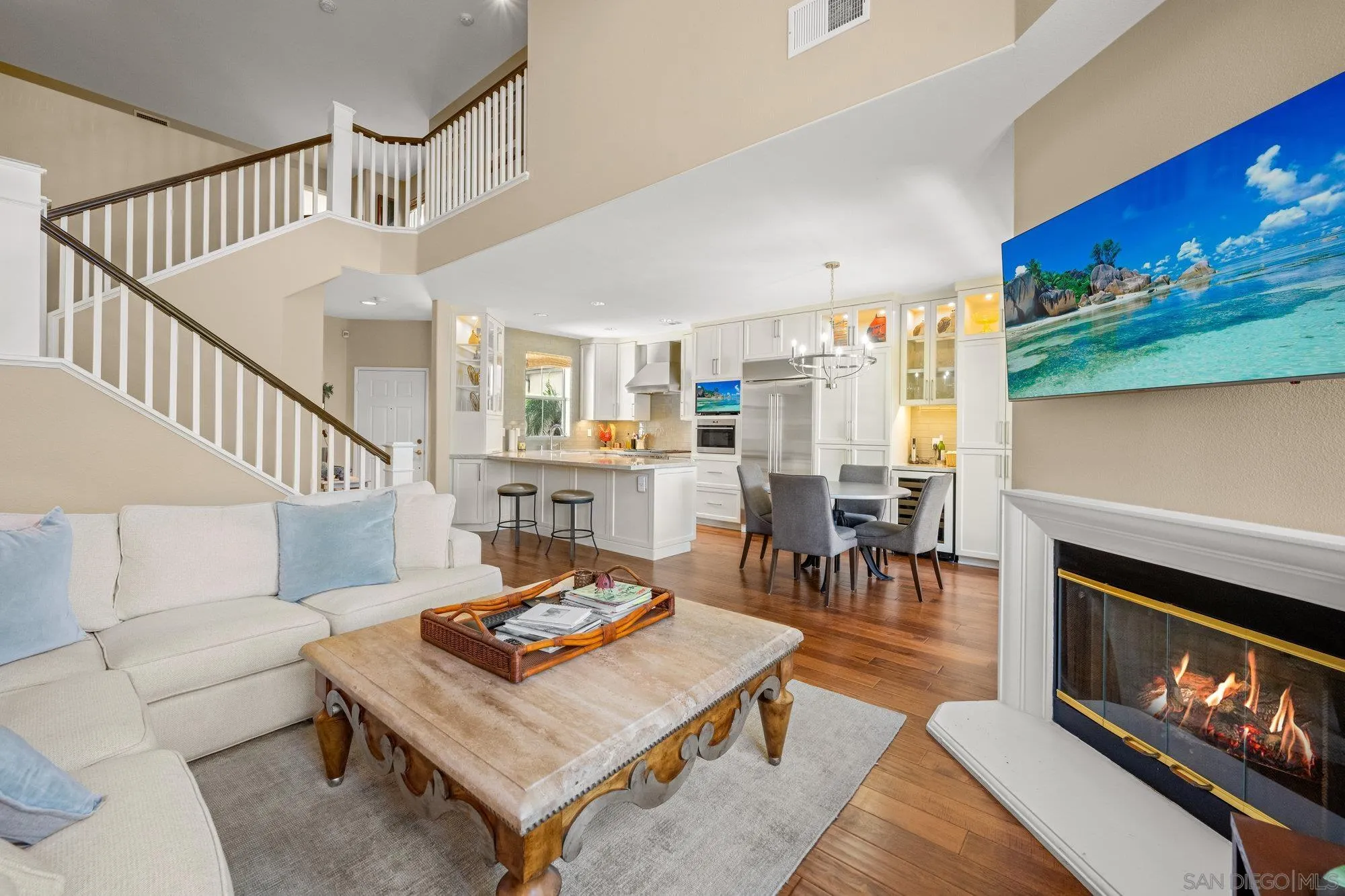 6845 Adolphia Drive Carlsbad, CA 92011 - Photo 10 of 33 a living room with furniture a table and chairs