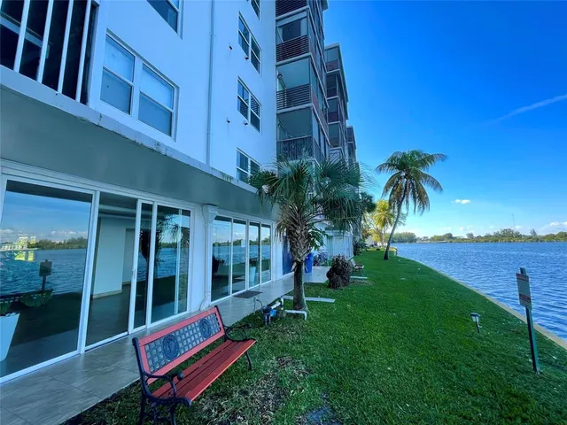 a view of a swimming pool with lounge chair