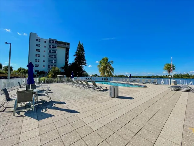 a house with palm trees in front of it
