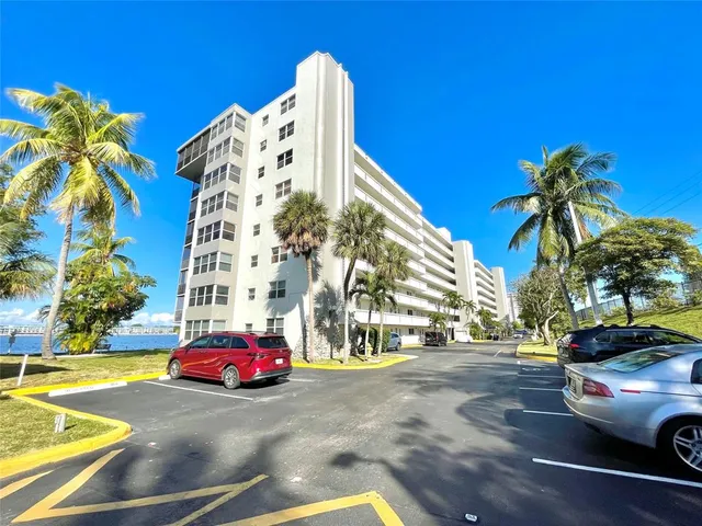 a view of a swimming pool with an outdoor space and seating area