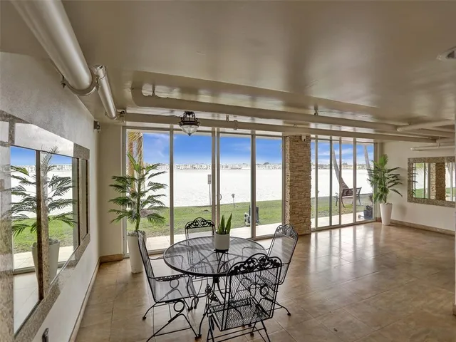 a view of a livingroom with furniture and window