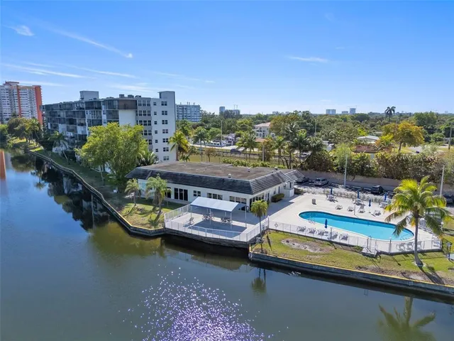 a view of a city with a lake