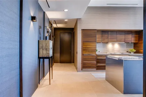 a bedroom with a bed and a table