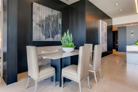 a kitchen with granite countertop stainless steel appliances and wooden cabinets