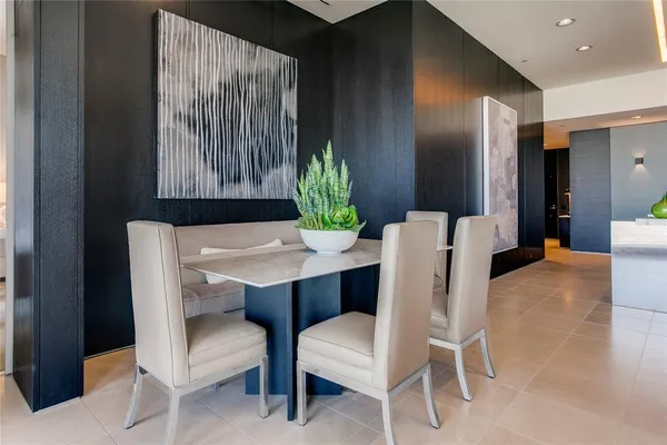 a kitchen with granite countertop stainless steel appliances and wooden cabinets