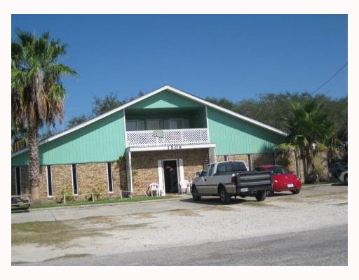 1507 South Mathis Street Rockport, TX 78382 - Photo 1 of 1 a car parked in front of house
