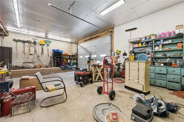 a room with gym equipment and a view of store