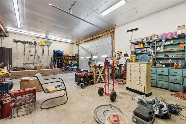 a room with gym equipment and a view of store