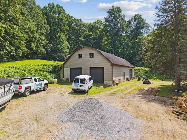 a view of car parked in front of house