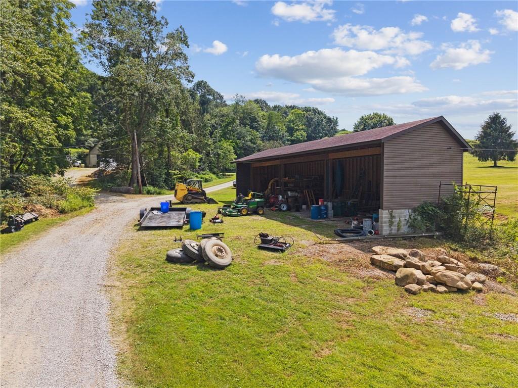 576 Stoney Run Road Blairsville, PA 15717 - Photo 9 of 21 a view of a swimming pool with a patio