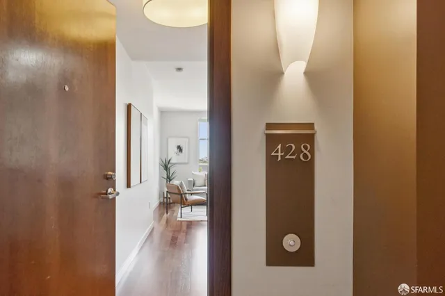 a view of a bathroom from a hallway