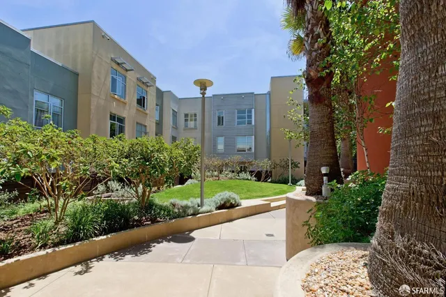 a view of a lake with outdoor seating