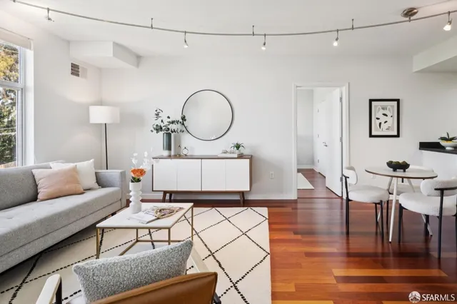 a living room with a couch and a table