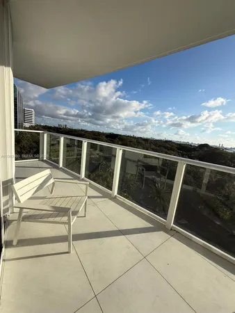 a view of a balcony with an outdoor space