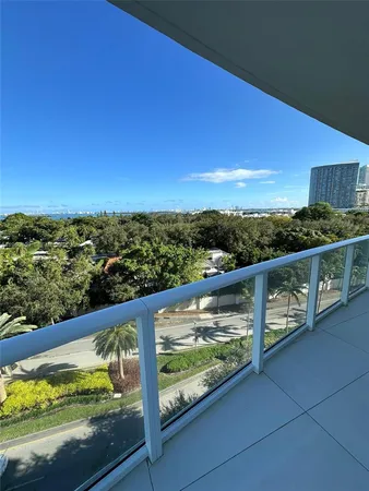 a room with furniture and a wooden floor