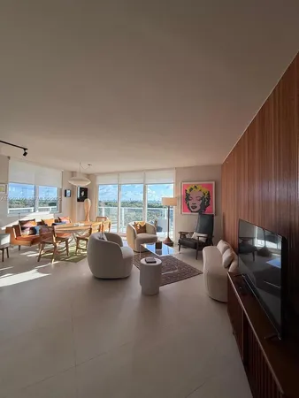 a terrace with a table and chairs