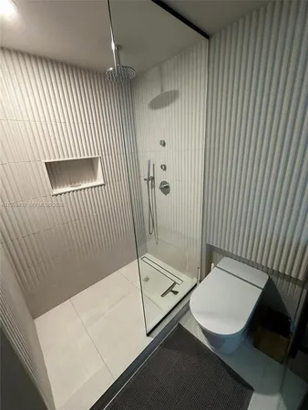 a bathroom with a sink and a shower
