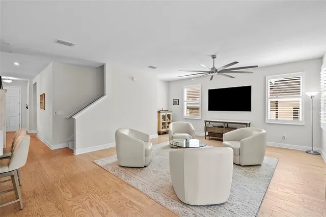 a kitchen with kitchen island a sink appliances and cabinets