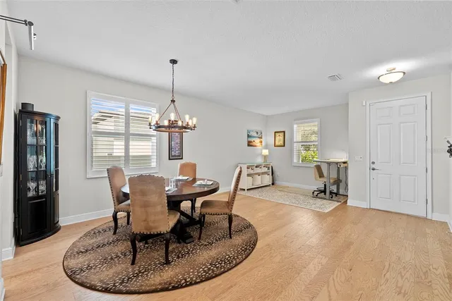 a bedroom with a bed and a view of closet