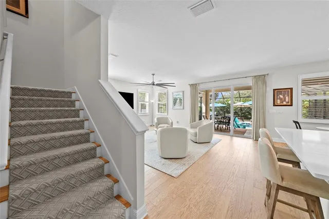 a bathroom with a shower sink vanity and mirror