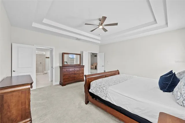 a view of a patio with table and chairs potted plants with wooden floor