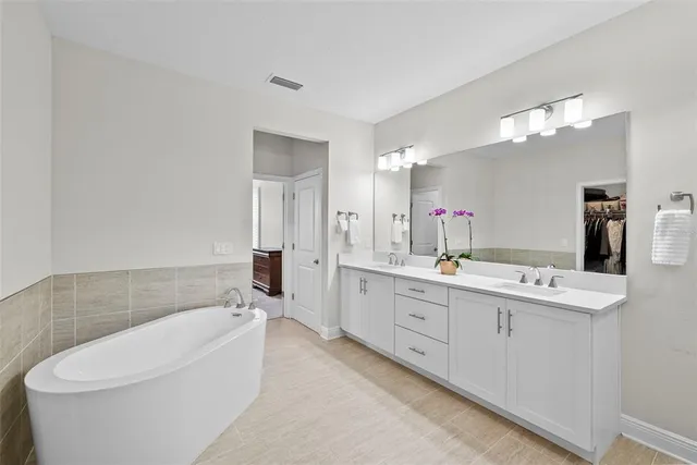 a view of yard with patio and green space