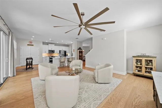 a kitchen with stainless steel appliances a refrigerator sink and stove