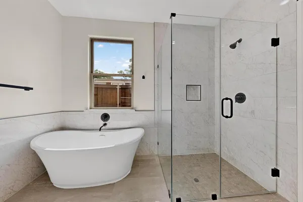 a kitchen with cabinets and window