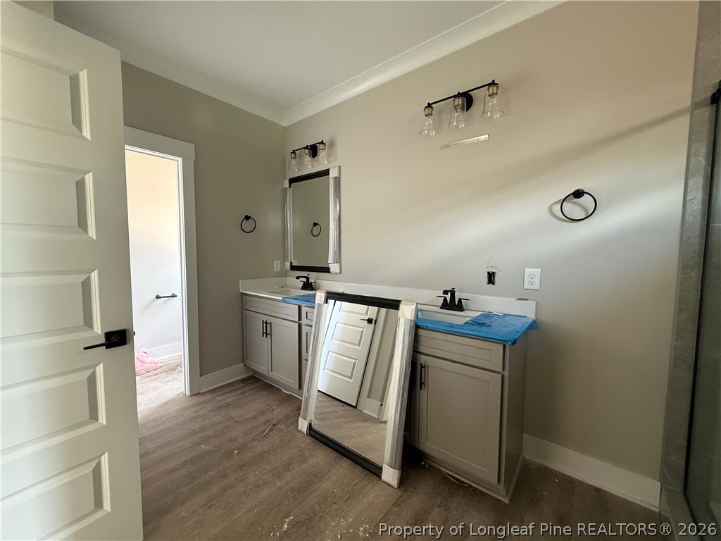 132 Ridge Stone Drive Autryville, NC 28318 - Photo 15 of 26 a utility room with cabinets washer and dryer