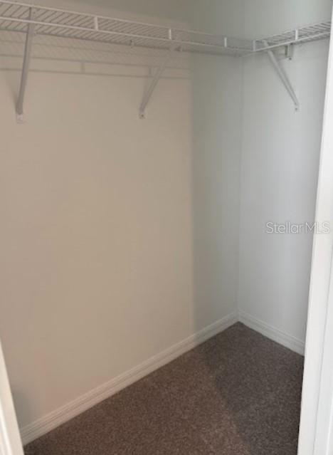 2927 Skyline Loop Kissimmee, FL 34758 - Photo 13 of 17 a room that has a window in it