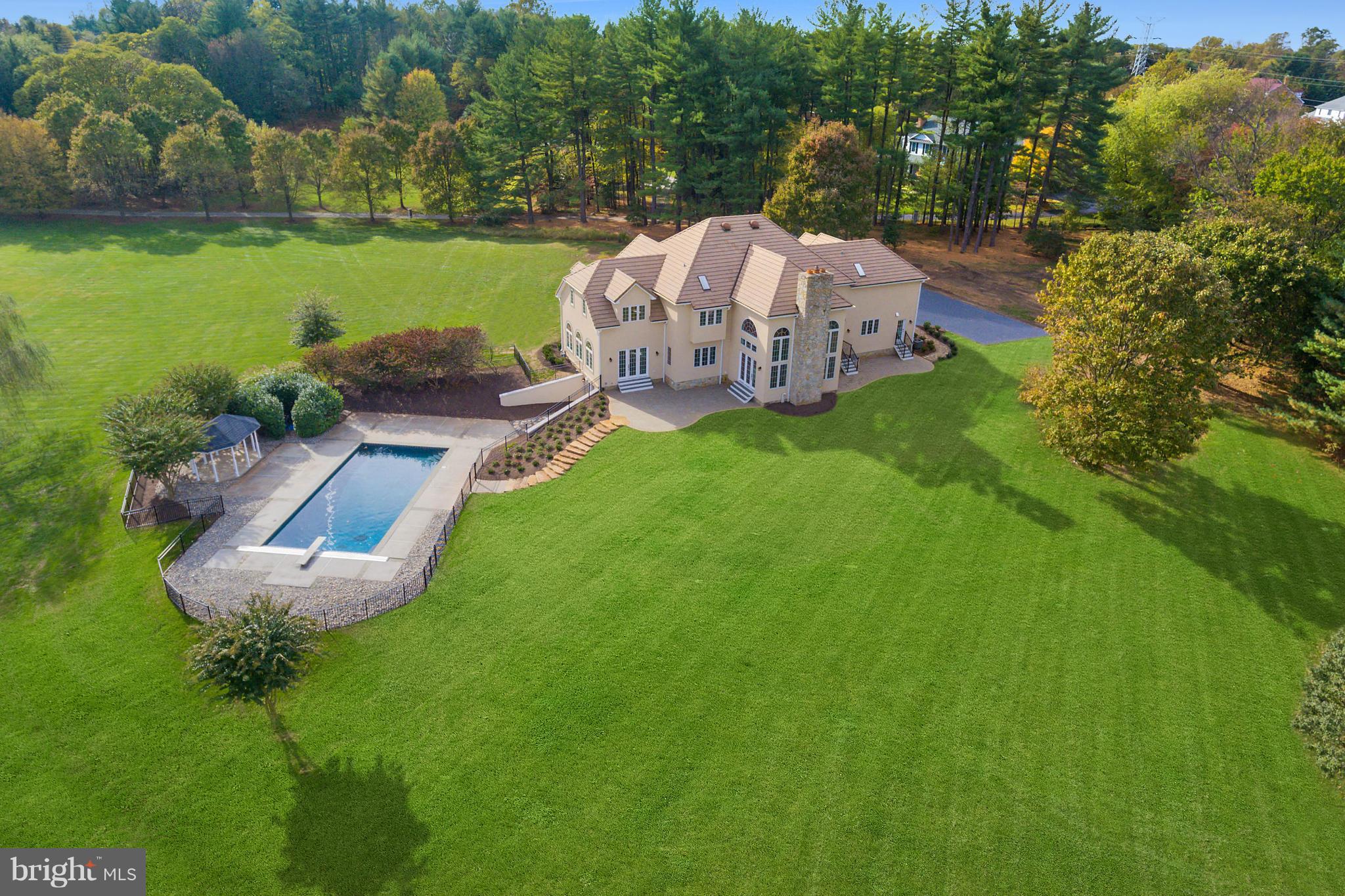 1904 Broadway Road Lutherville-Timonium, MD 21093 - Photo 6 of 30 an aerial view of a house with garden space and a lake view