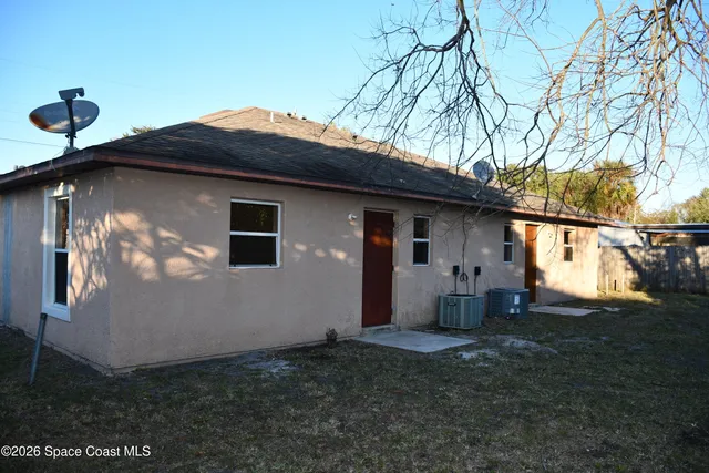 a view of backyard of house