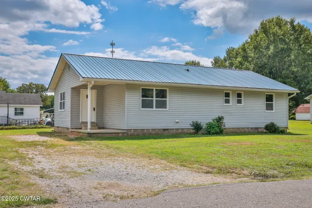 a view of a house with a swimming pool