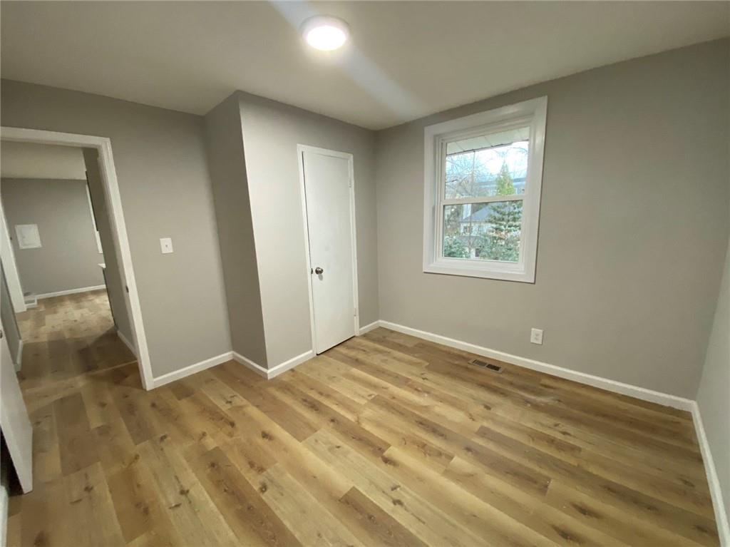 951 Tilden Street Northwest, Unit A Atlanta, GA 30318 - Photo 3 of 6 a view of an empty room and window
