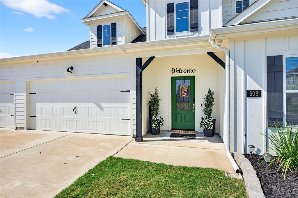 608 Finlee Way Tioga, TX 76271 - Photo 4 of 35 a front view of a house with a yard