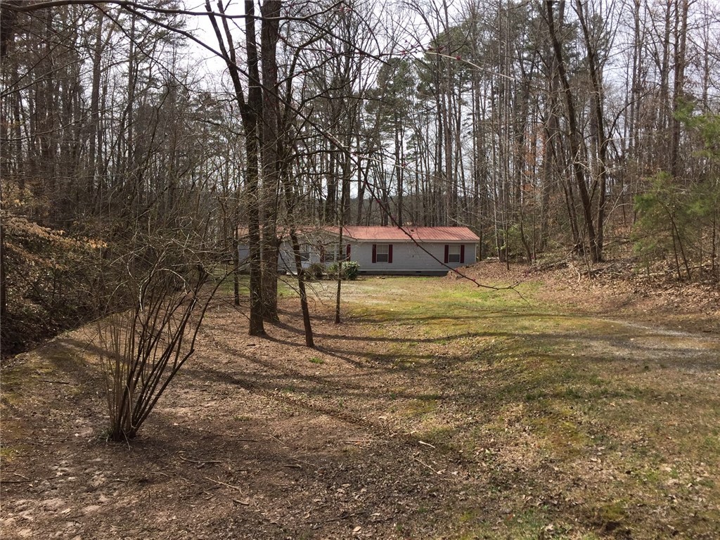 167 Welters Cove Road Westminster, SC 29693 - Photo 20 of 23 View from Back of Home from Lake-Notice that Sunro