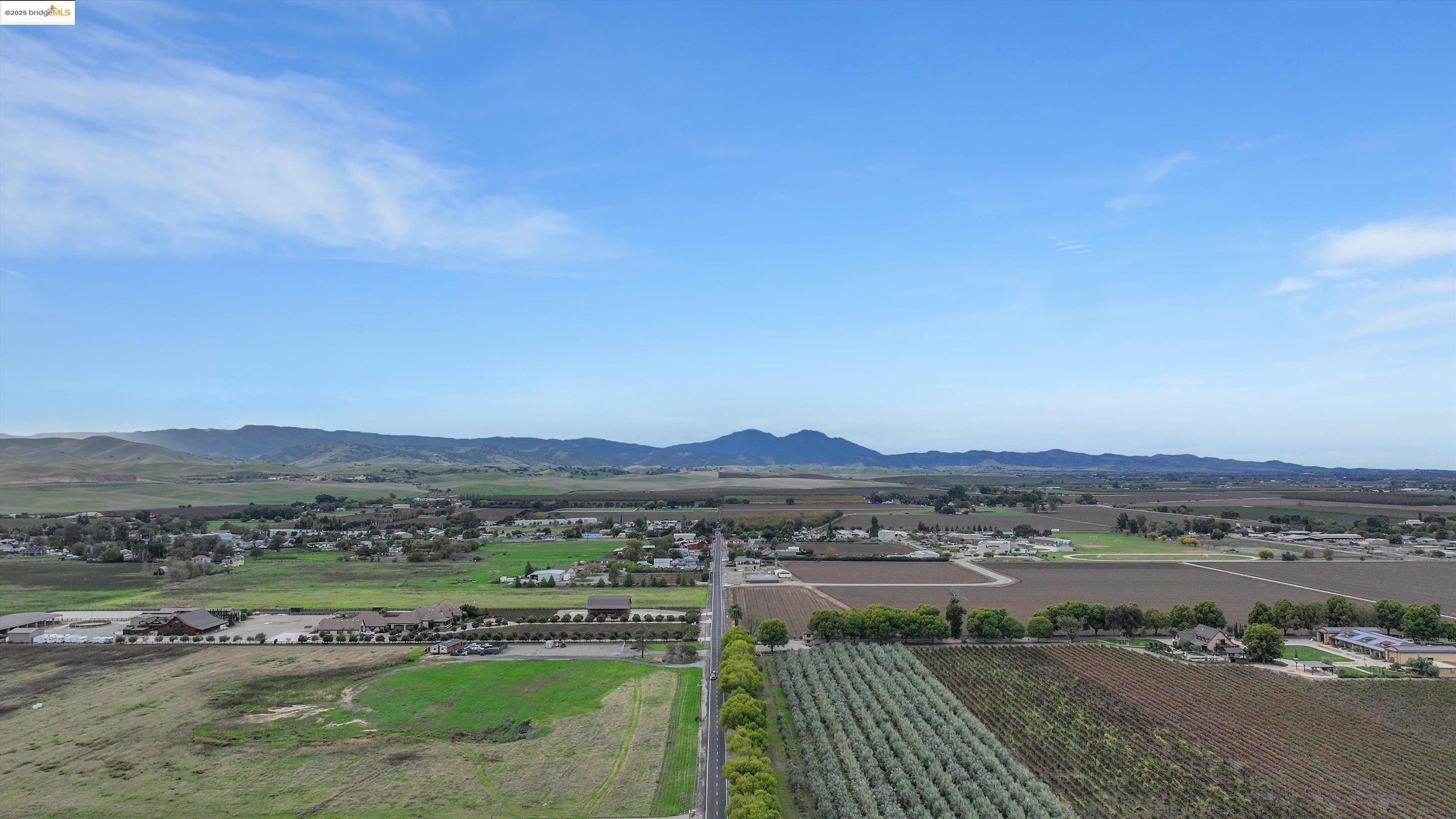 3590 Byer Road Byron, CA 94514 - Photo 7 of 12 View of mountain background featuring rural landscape and rows of crops