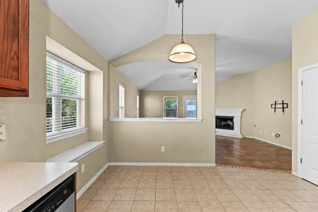 a view of livingroom with furniture wooden floor and window