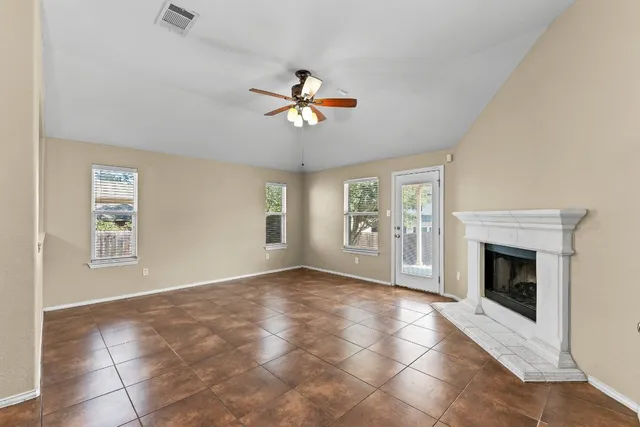 a view of livingroom window and fireplace