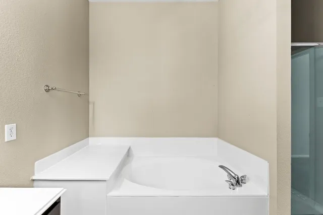 a bathroom with a bathtub