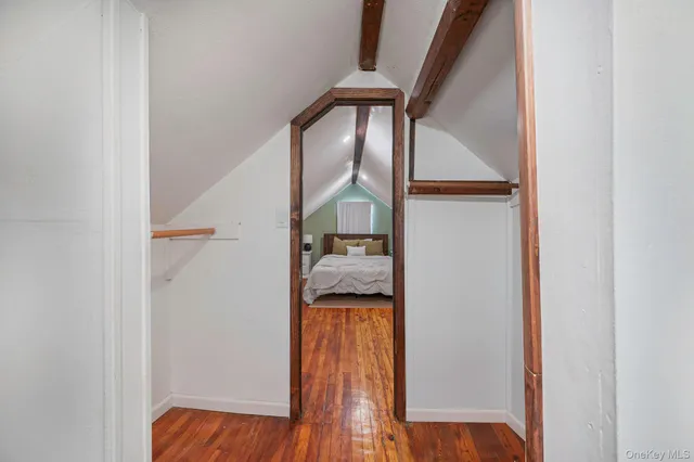 a bathroom with a sink a toilet and shower curtain