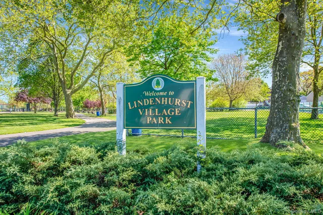 a view of a chair in the backyard of house